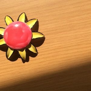 Vintage Red yellow and black brooch with gold back